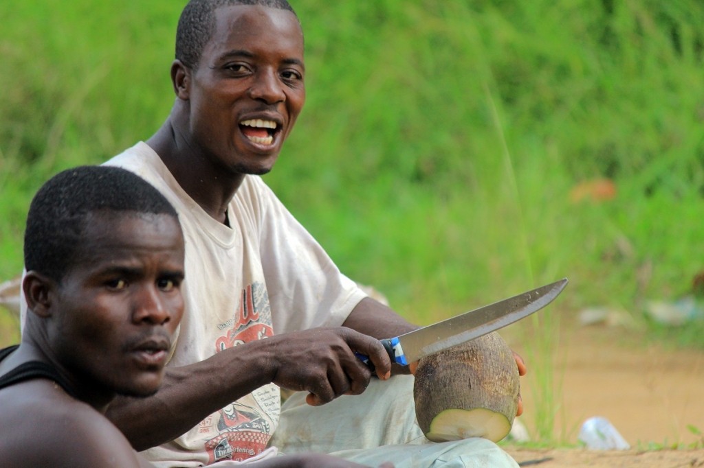 Making traditional coconut oil in Liberia.
